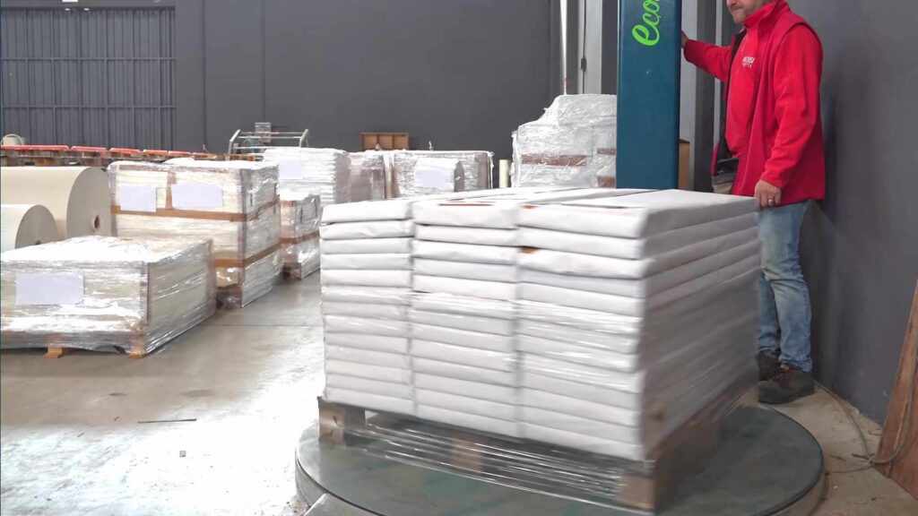 Pallet of paper packs on a stretch-wrapping machine